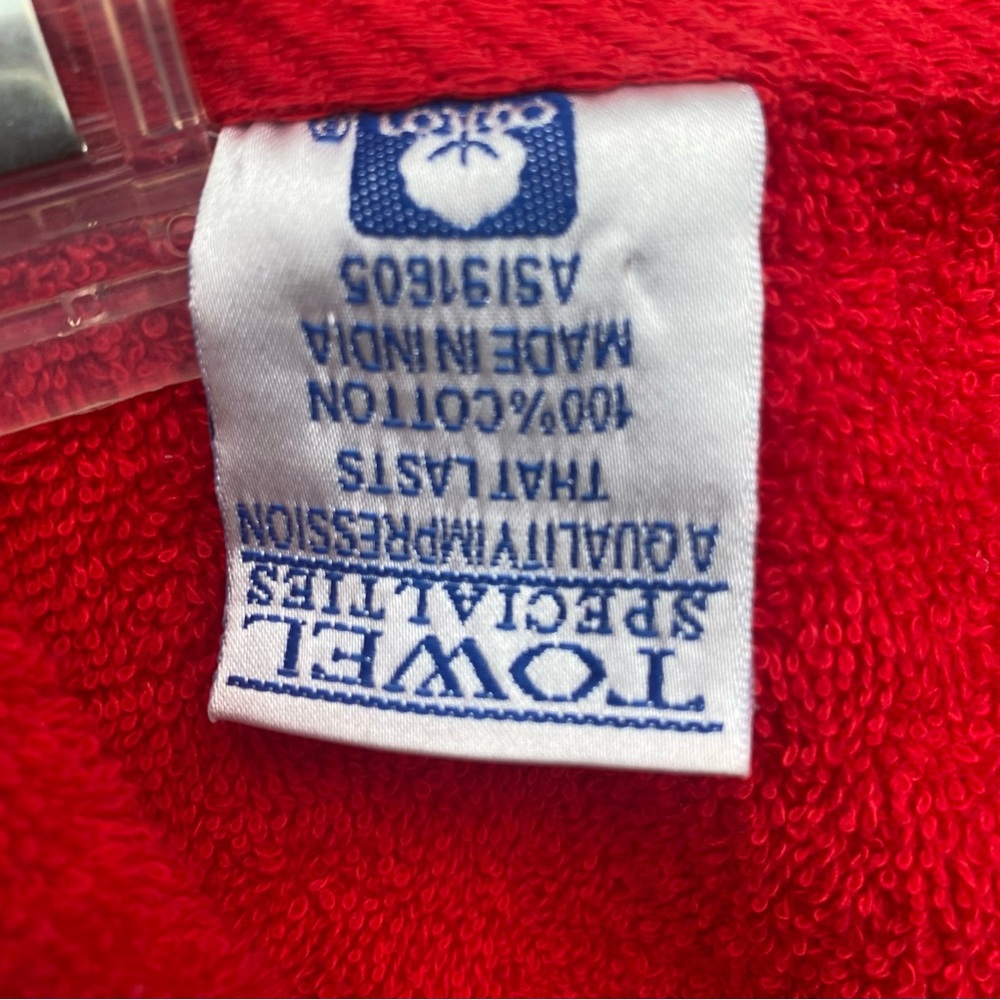 Towel Specialties -beach towel that folds into attached bag 100 cotton 34” X 58”